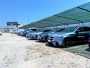 mercedes sotto pensilina ombreggiante nel parcheggio pubblico custodito del porto di Vieste Puglia Gargano Italy