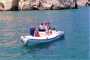 Francesco Trimigno Skipper mentre guida il suo gommone a Vieste in Gargano Puglia